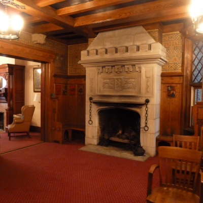 The meeting room is entered through the parlor.  The magnificent baronial fireplace warms the room on cold nights.