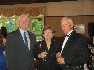 Board of Managers Chairman Peter McKee and wife Lynn with member William Burke