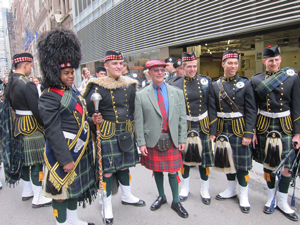 President Patrick Foywith members of the U. S. Navy Pipe Band directed by Navy Commander CoreyBarker